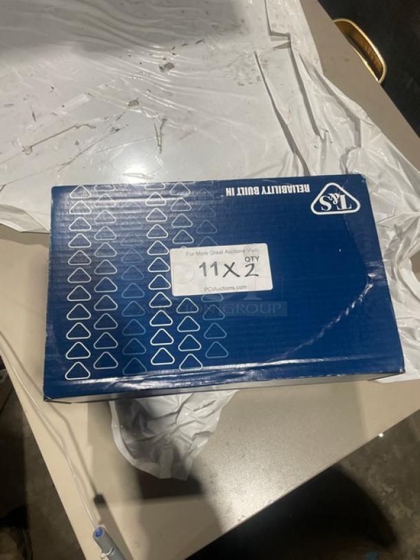 Brand new T&S B-0155 commercial 6" add-on faucet in box. Features lever handle. Box marked with auction label.