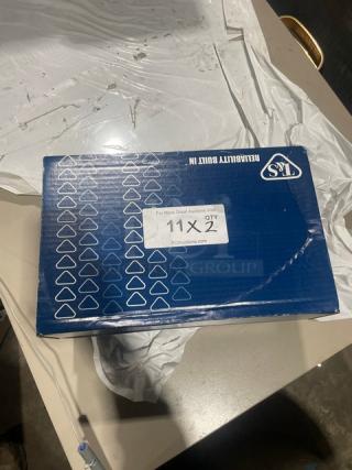 Brand new T&S B-0155 commercial 6" add-on faucet in box. Features lever handle. Box marked with auction label.