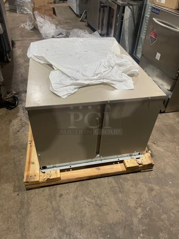 Heatcraft CZT025M6D condensing unit on pallet. Electric, 460V, 3-phase. Good condition, beige finish. SN: T10H09787.