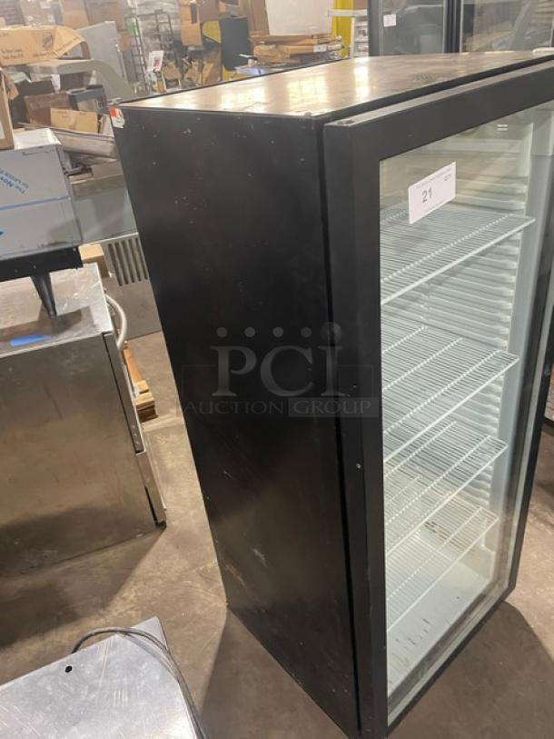 Liebherr 2019 commercial black glass door beverage refrigerator, Model VC213264000, with poly-coated wire rack.