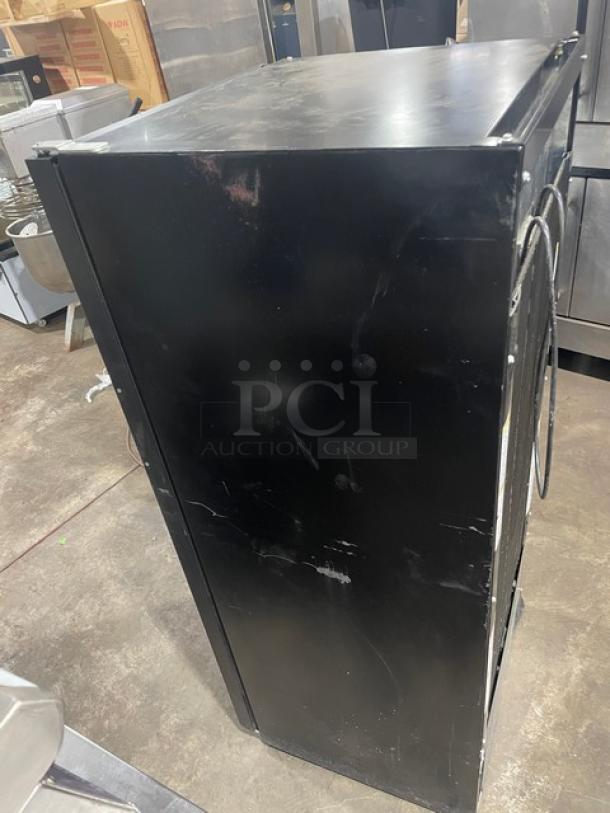 Liebherr 2019 black single glass door commercial refrigerator, model VC213264000, with poly coated wired rack, 115V.