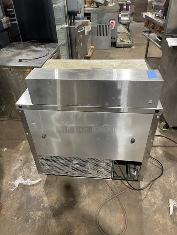 True Commercial 2 Door Refrigerated Bain Marie Prep Table, Model TSSU-36-08, stainless steel with cutting board, on casters.