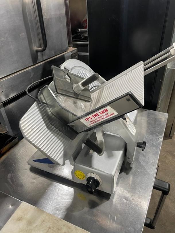 Bizerba commercial electric deli meat slicer on legs, with adjustable blade, safety guard, and power controls; used condition.