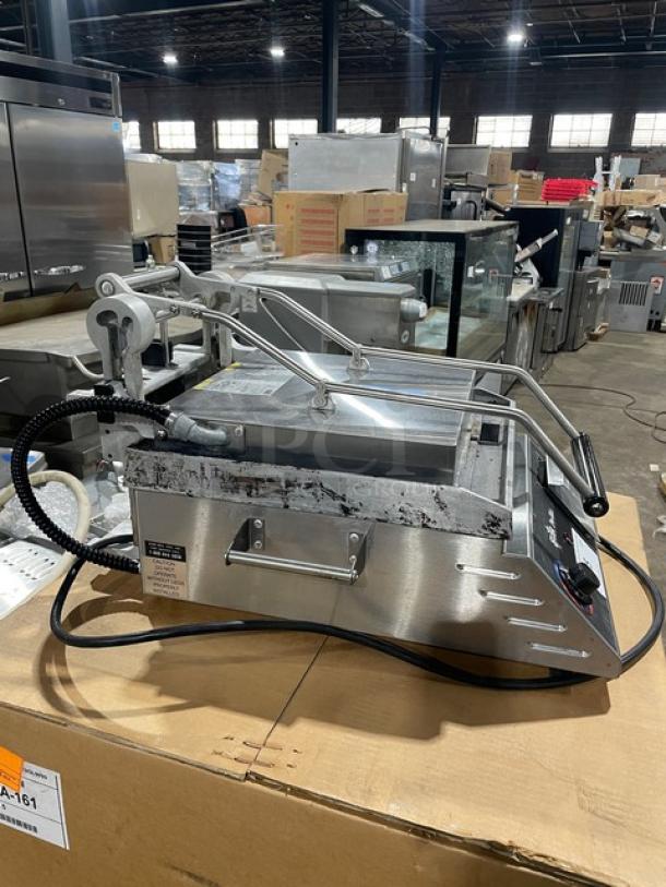 Star Pro-Max Series stainless steel electric countertop panini press; good condition; visible wear; model details on side.