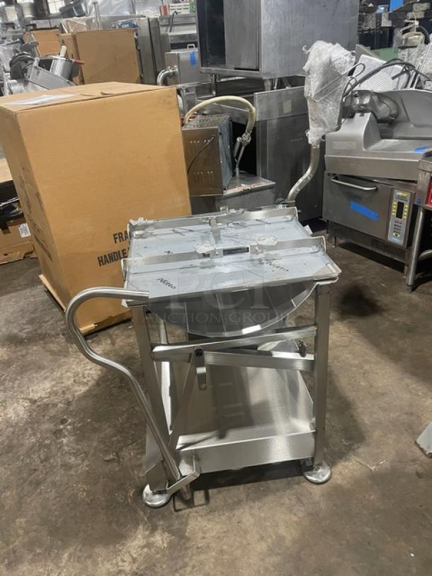 M&E Fresh Deli Pro Series stainless steel cart with slicer mount, undershelf, legs, and casters; in excellent condition.