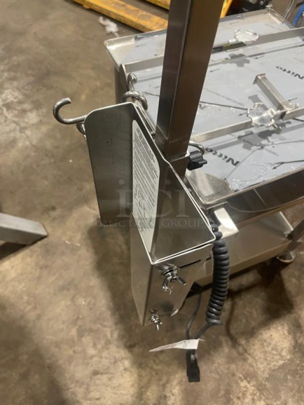 M&E Face-To-Face Fresh Deli Pro Series stainless steel equipment cart with undershelf, slicer mount, legs, and casters.