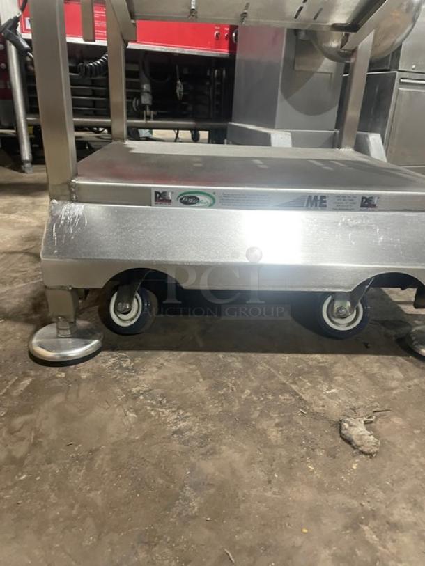 M&E Deli-Buddy stainless steel equipment cart with slicer-mount, undershelf, legs, casters; commercial-grade, durable.