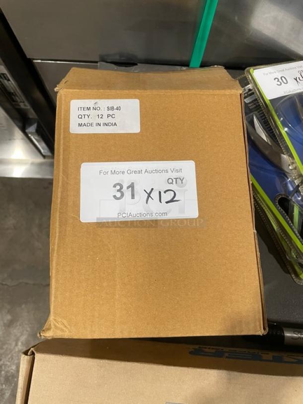 Cardboard box of Adcraft SIB-40 stainless steel bowls, labeled "12 PC, Made in India." Auction details sticker visible.