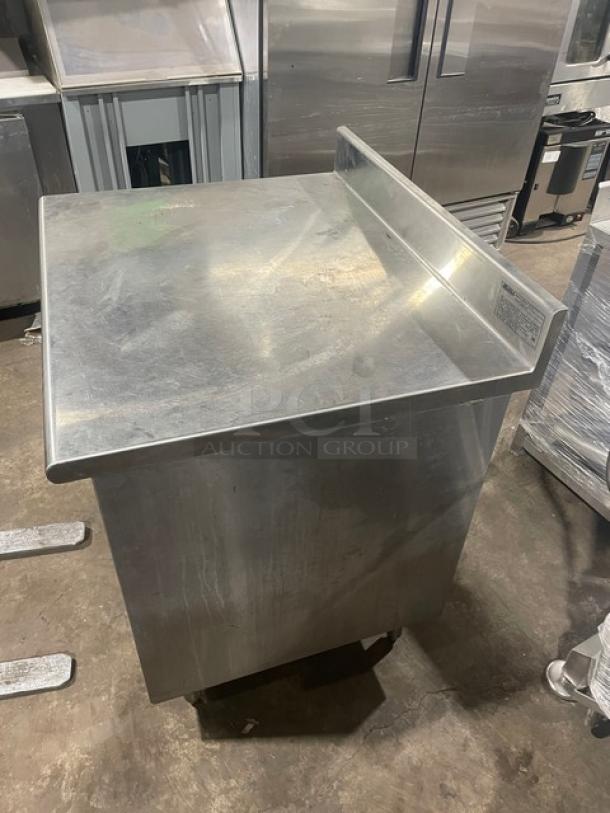 Eagle Group stainless steel worktable, model CB3036SEBSCS, 30"x36", with enclosed cabinet base and up-turned backsplash.