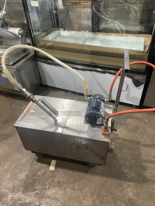 Darling Model 402 stainless steel electric oil filter/caddy, 175 lb capacity, 120V, on casters, used condition.