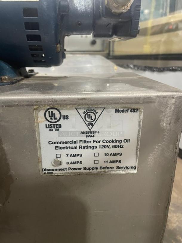 Darling Model 402 stainless steel electric cooking oil filter, 175 lb capacity, 120V, on casters, UL listed label visible.