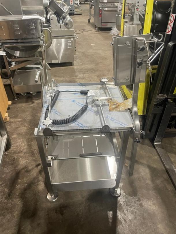 M&E Face-To-Face Fresh Deli Pro Series stainless steel equipment cart with slicer mounting, undershelf, legs, and casters.