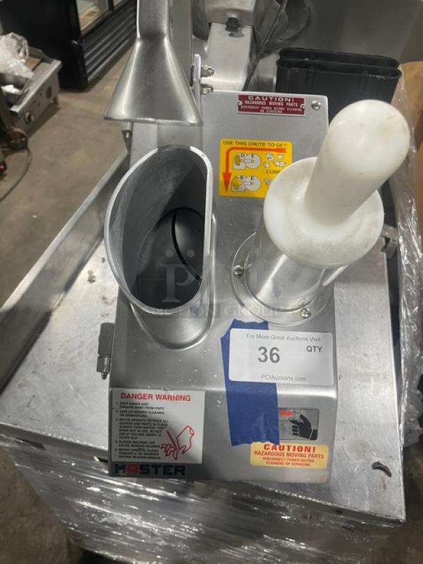 Fleetwood MASTER commercial stainless steel vegetable processor, Model D9711821, 115V, with labels and safety warnings.