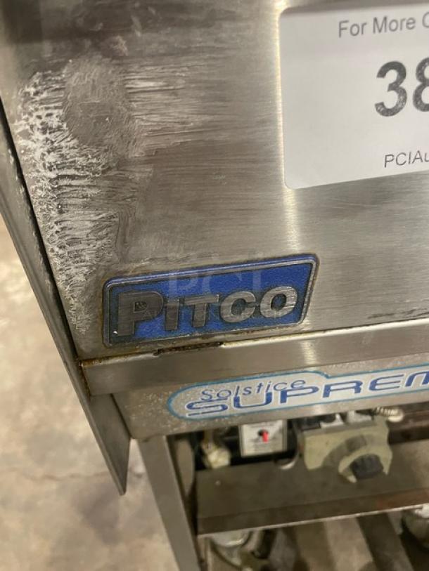Pitco Solstice Supreme Series stainless steel pasta cooker, natural gas, with splash guard, basket hanger, on casters.