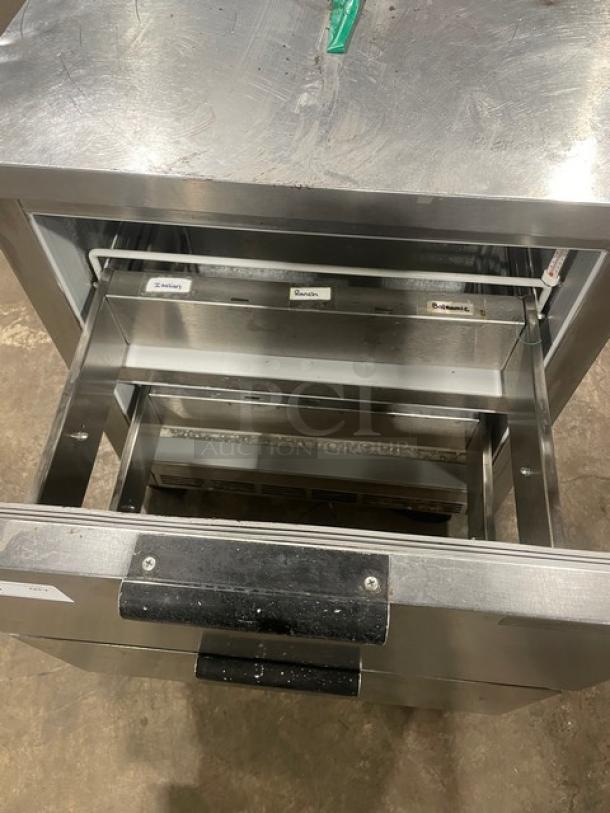 Beverage-Air stainless steel 2-drawer worktop fridge, model WTRD27A, on casters. Features organized interior labels.