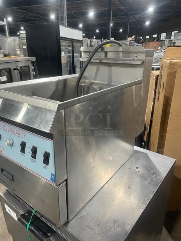 Pitco Frialator Pasta Perfect commercial countertop pasta cooker, stainless steel, electric, with basket hanger and backsplash.