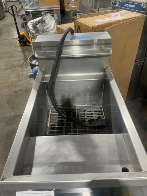 Pitco Frialator Pasta Perfect commercial stainless steel electric countertop pasta cooker with backsplash and basket hanger.