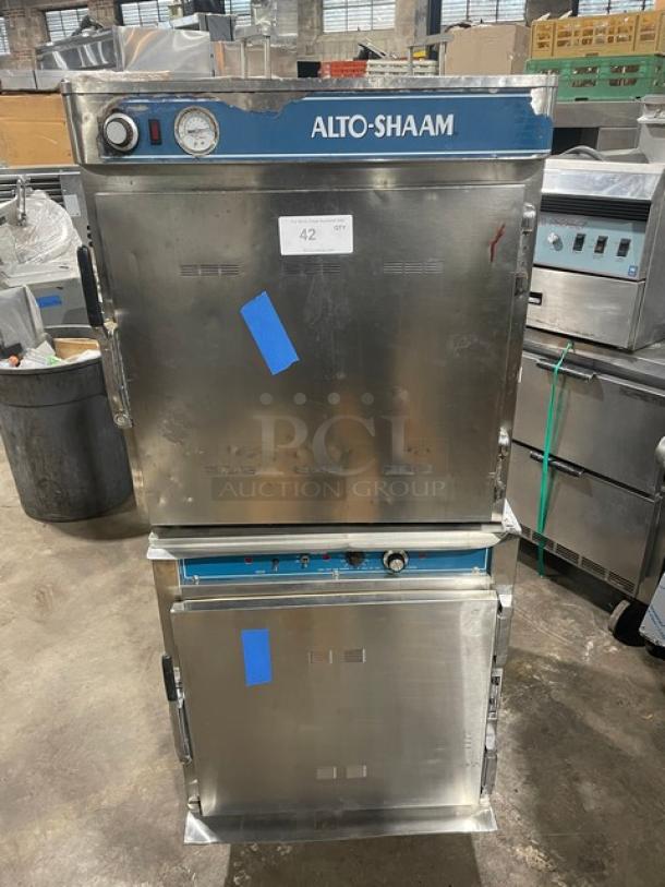 Alto-Shaam Halo Heat stainless steel double-stacked cook/hold oven, includes wired oven rack, on casters, commercial use.