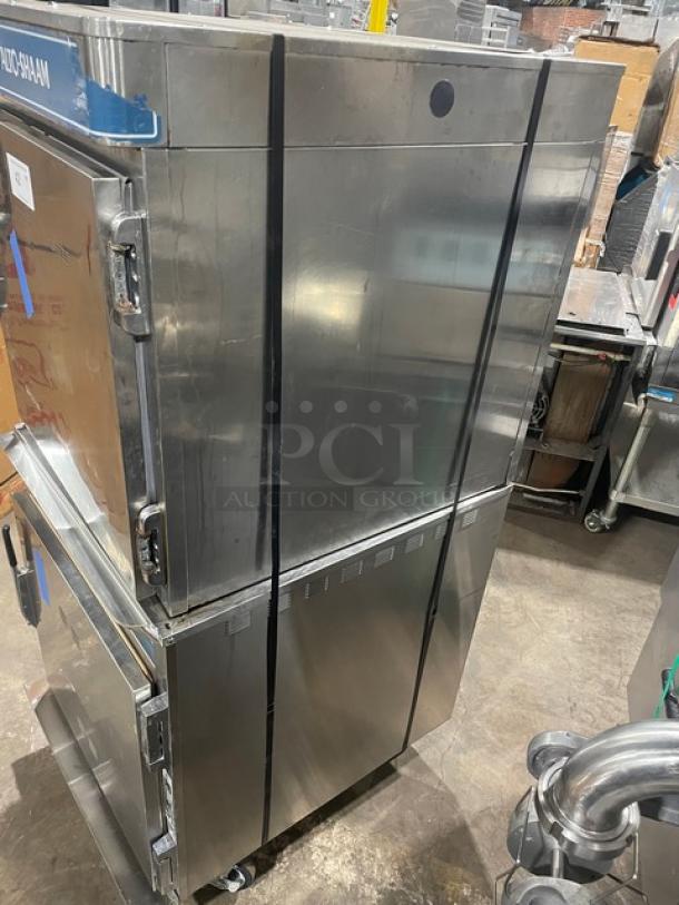 Alto-Shaam Halo Heat Series stainless steel double stacked cook/hold oven, on casters, with wired rack, commercial use.