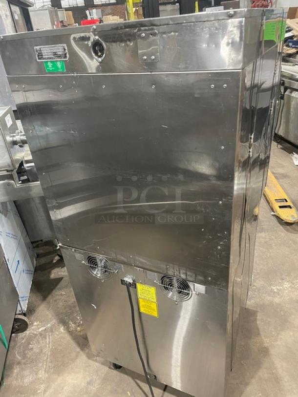 Alto-Shaam Halo Heat stainless steel double stacked cook/hold oven, includes wired rack, on casters, commercial use.