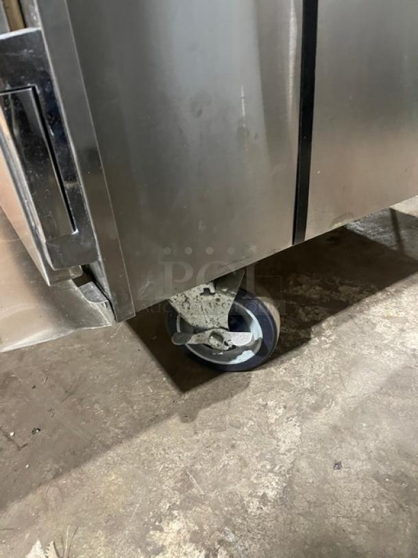 Alto-Shaam Halo Heat stainless steel double oven, on casters, featuring wired rack. Commercial-grade, used condition.