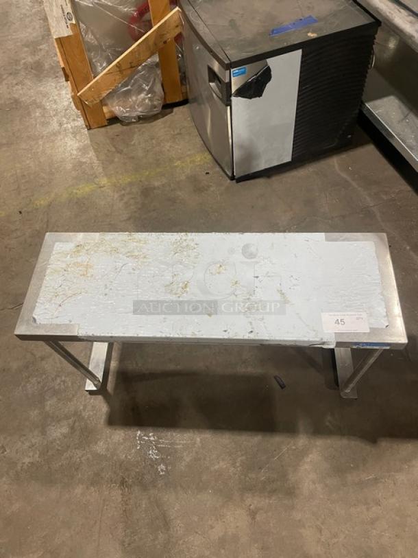 BK Resources 36"x12" stainless steel overhead shelf, model BKOSS1236, in used condition with slight surface wear.