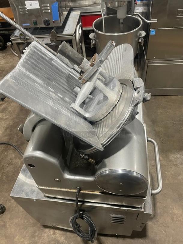Commercial electric deli meat slicer, Model 1712, SN: 1624705, 115V, 1 Phase, on legs, used condition.