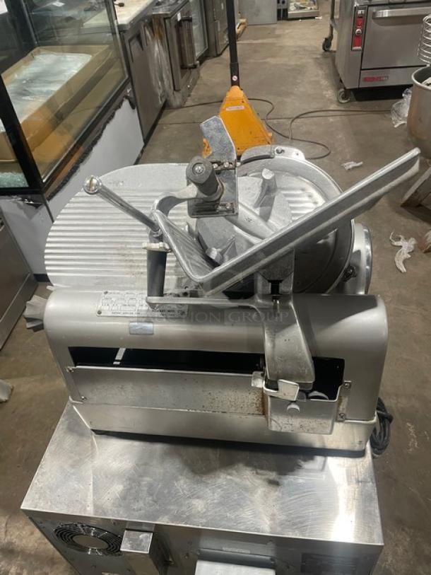 Commercial electric deli meat slicer, Model 1712, SN: 1624705, 115V, 1 Phase, on legs. Countertop design, used condition.