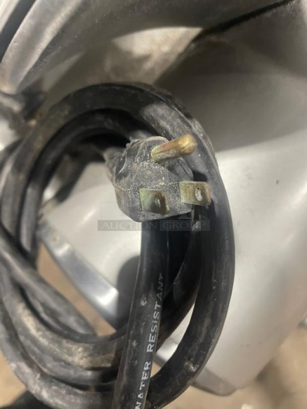 Electric powered countertop deli meat slicer, Model 1712, SN: 1624705, in used condition. 115V, 1 Phase, on legs.