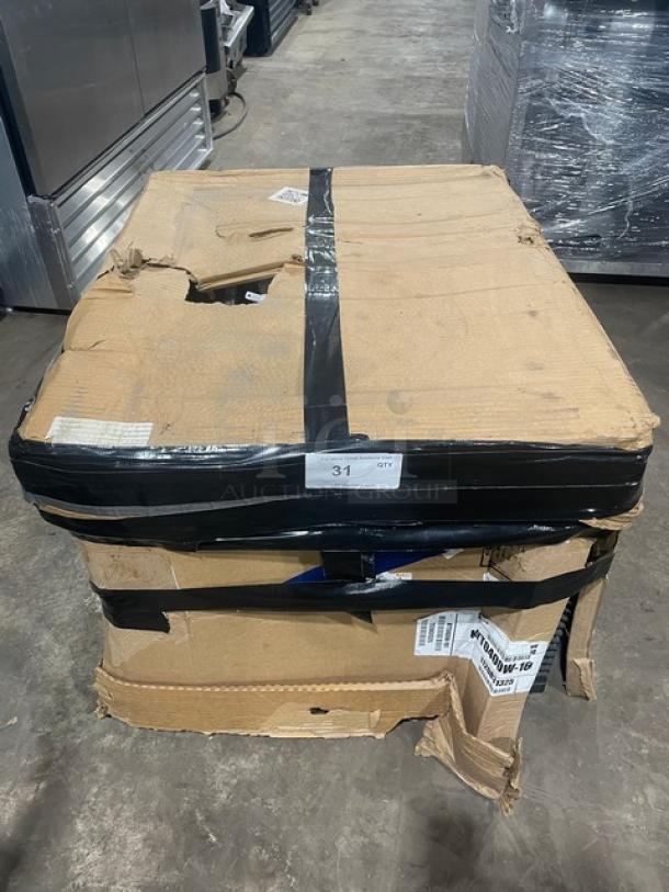 Manitowoc ice machine, Model KYT0400W161, in damaged packaging. Features stainless steel, water-cooled, half-cube ice making. 115V.