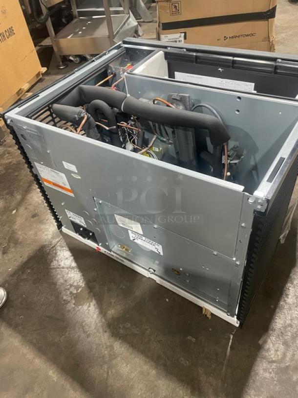 NEW Manitowoc KYT0400W-161 ice maker head; stainless steel, water-cooled, half cube style, electric, scratch-n-dent, 115V.