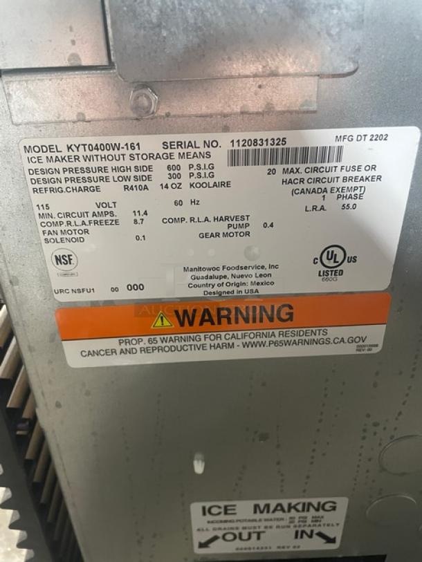 Manitowoc ice machine head, model KYT0400W-161, 115V, water-cooled, stainless steel, new with minor scratches. Serial: 1120831325.