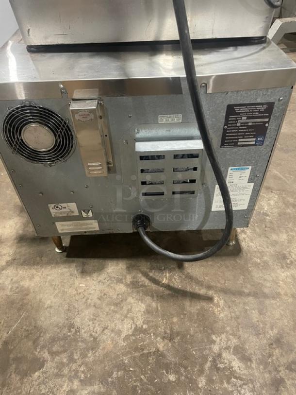 TurboChef NGC commercial ventless rapid cook oven with digital controls, stainless steel, on legs, with double undershelf cart.