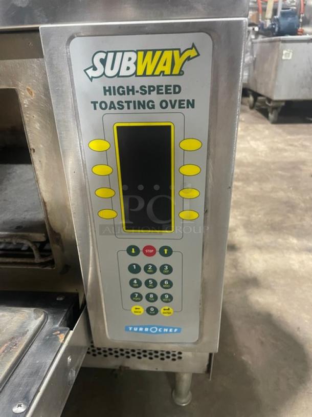 TurboChef NGC Subway-style high-speed toasting oven with digital controls, ventless design, on double undershelf cart.