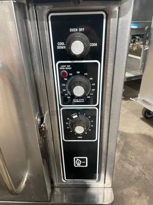 Blodgett stainless steel half-size convection oven, natural gas powered, with solid-state thermostat and wired oven rack.