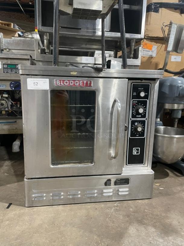 Blodgett stainless steel natural gas half-size convection oven with solid-state thermostat, wired rack, door handle.
