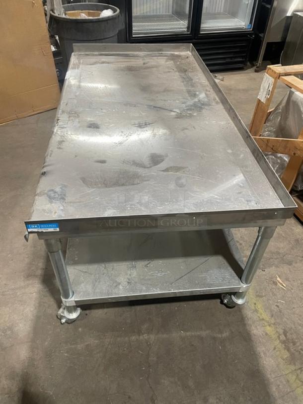BK Resources stainless steel equipment stand, 60"x30", model VETS-6030, with galvanized undershelf, on casters.