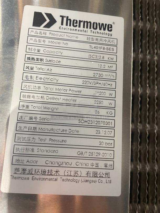 Thermowe TL401F8-SES stainless steel condensing unit, electric-powered, 220V 3-phase, Serial: SOH2312070301, label showing specifications.