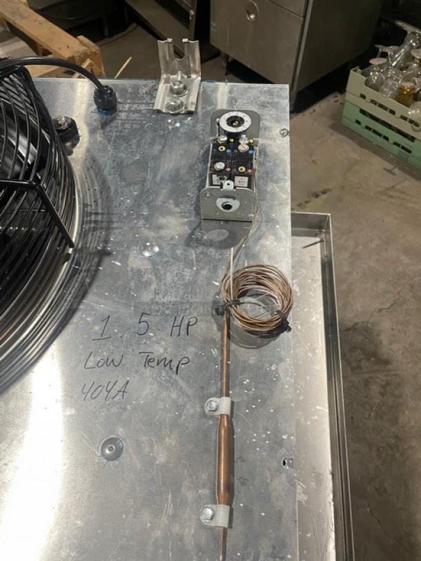 Thermowe TL401F8SES stainless steel condensing unit, 2023 model, marked with "1.5 HP Low Temp 404A." Electric, 220V, 3 Phase.