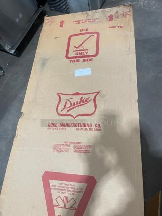 New Duke Aerohot Series 304P stainless steel 4-well hot food steamtable with cutting board in original packaging.