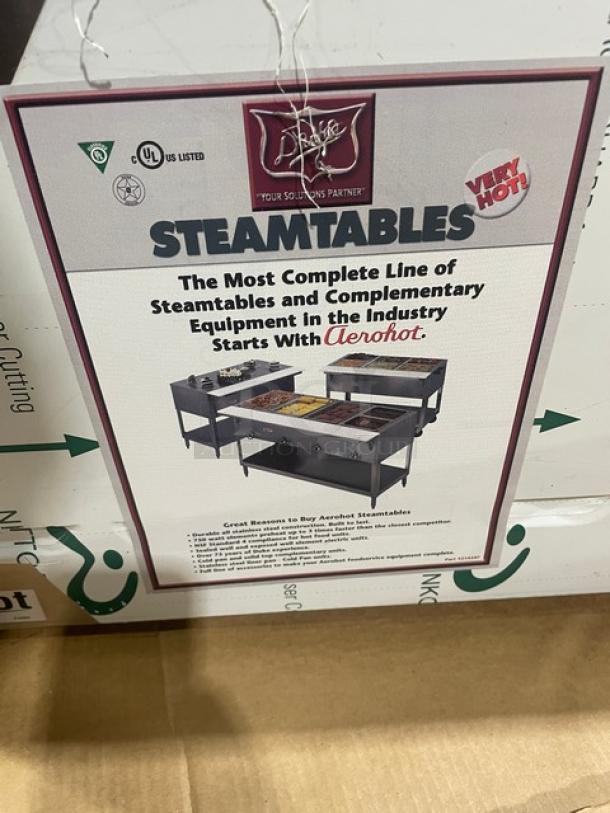 NEW Duke Aerohot 304P stainless steel 4-well hot food/steamtable with cutting board, Model 304P SN: 11101102, in box.