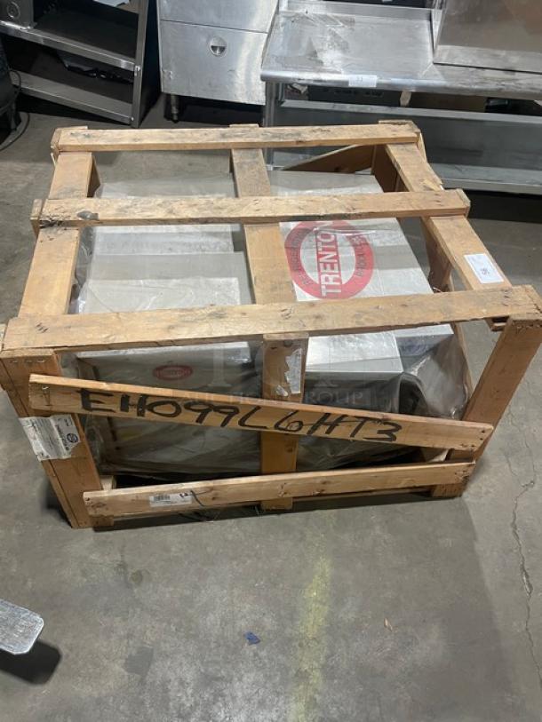 Trenton Refrigeration stainless steel condensing unit in wooden shipping crate. Model: EH099L6HT3ABR, 208-230V, 3 Phase.
