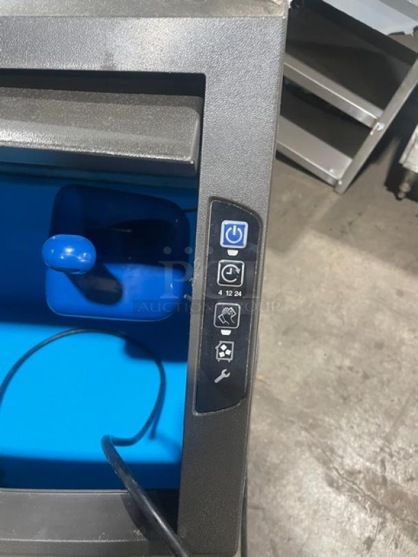 Manitowoc stainless steel undercounter ice maker, electric, SN:310620659, with control panel, on legs, 115V, 1 phase.