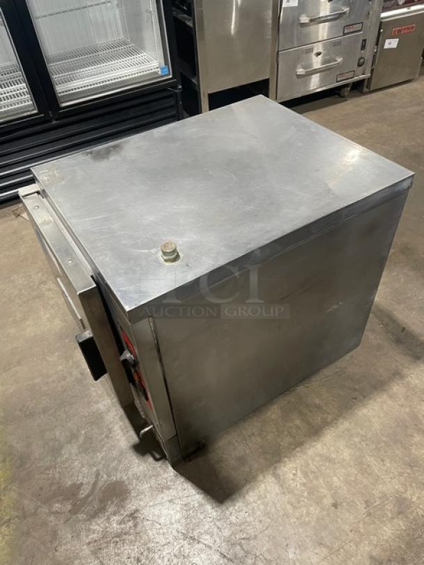 Vulcan C24EA5 stainless steel electric countertop steamer cabinet with wired rack, 208/240V, good condition.