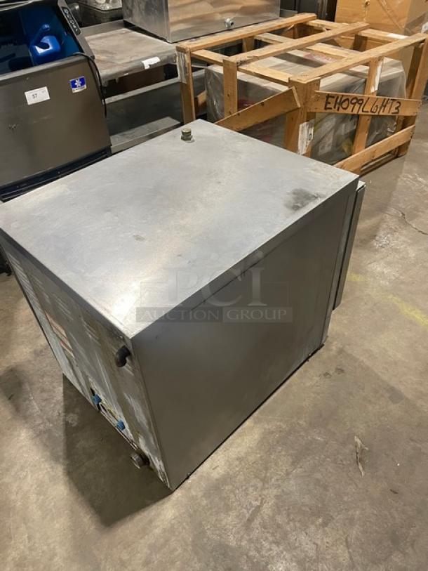 Vulcan C24EA5 commercial stainless steel electric steamer cabinet with wired rack. Features single compartment, 208/240V 3/1 phase socket. Appears unused with minor surface marks. Serial number 46-3008309.