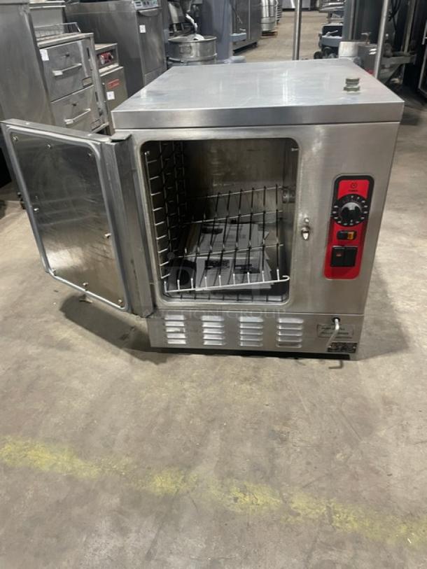 Vulcan C24EA5 stainless steel electric steamer, open door with wired rack visible. Model: C24EA5, SN: 46-3008309, 208/240V.