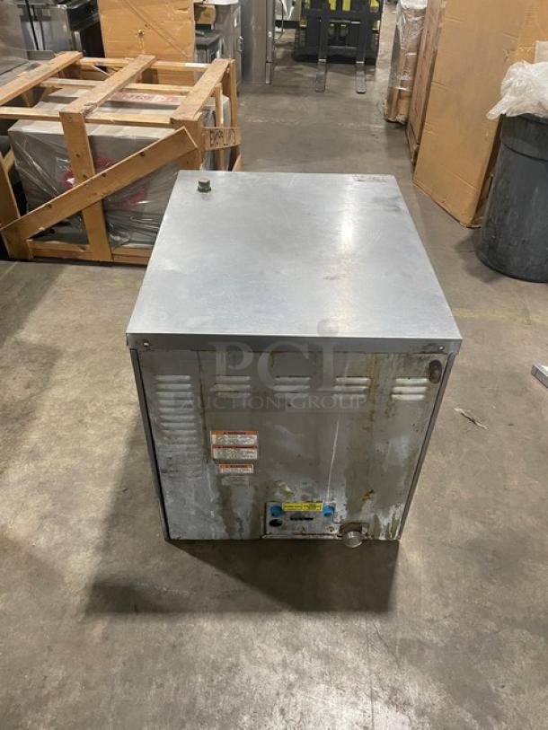 Vulcan C24EA5 stainless steel electric countertop steamer, single compartment, wired rack, SN: 46-3008309, 208/240V 3/1 Phase.