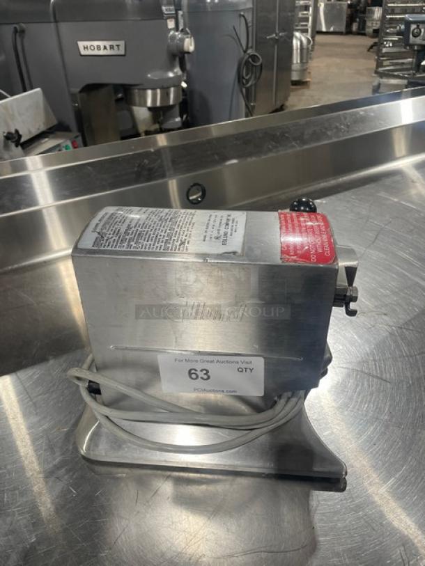 Edlund Model 270 electric can opener, stainless steel, 2-speed, countertop, 115V. Features brand and model markings.