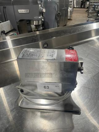 Edlund Model 270 electric can opener, stainless steel, 2-speed, countertop, 115V. Features brand and model markings.