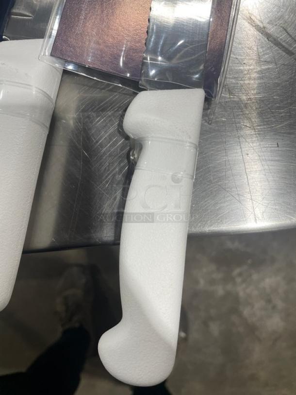 Dexter Russell Basics 12" scalloped slicer, stainless steel blade, white grip handle, new condition.